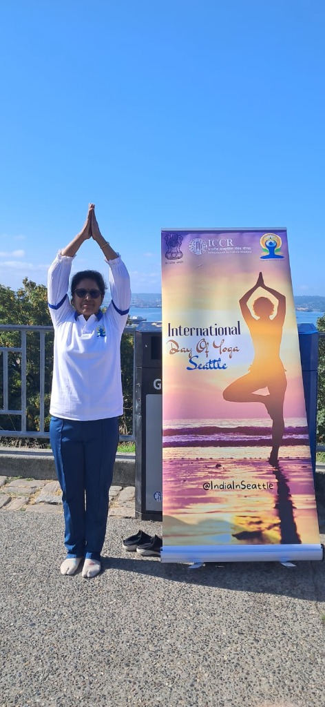 Dr. Seema Saxena doing tree pose at International Day of Yoga in Seattle